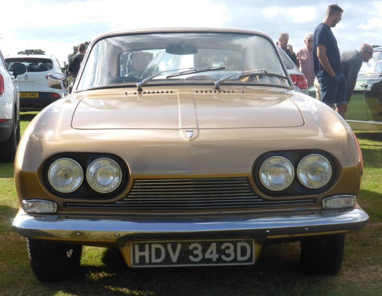 2553cc Ford Zodiac straight-six engine with 3 carburettors.